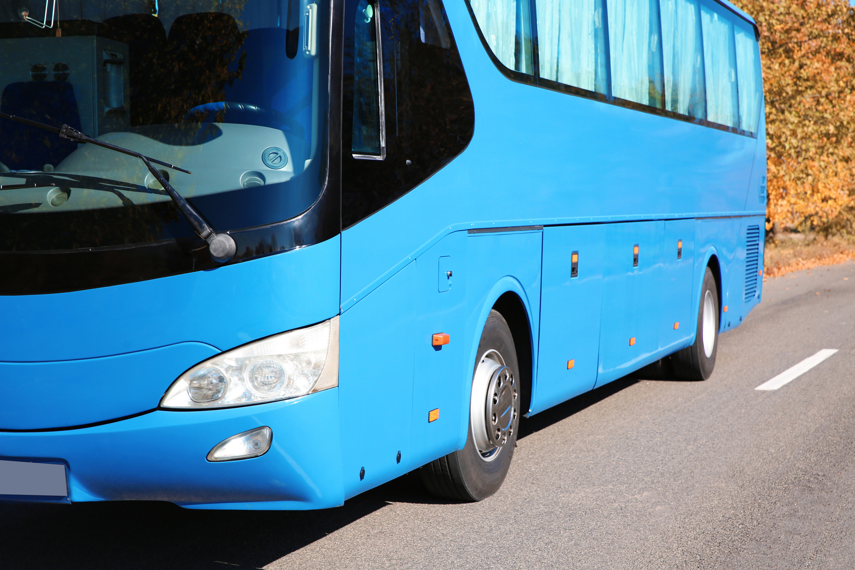 Modern Blue Bus on Road. Passenger Transportation